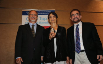 Tim Cross with Amy Brand, winner of the 2015 Meritorious Achievement Award, and Ken Heideman.