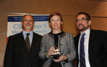 Tim Cross with Heather Goodell, winner of a 2015 Distinguished Service Award, and Ken Heideman.