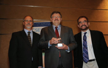 Tim Cross with William Lanier, winner of a 2015 Distinguished Service Award, and Ken Heideman.