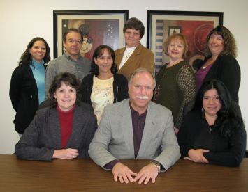 CSE management staff. Seated from left: Kristi Klinke, David Stumph, and Carla Pacheco. Standing from left: Jeannine Broker, Carlos Fierro, Linda Pocsik, Jan Hathaway, Barbara Trumbo, and Ruth Gleason Roth.